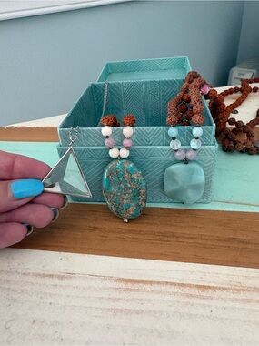 Three tiny devotions necklaces - two malas and one silver triangle necklace